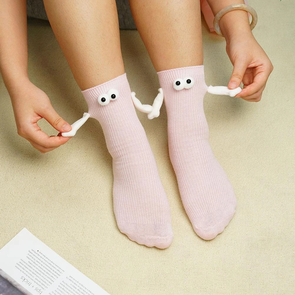 hands holding socks